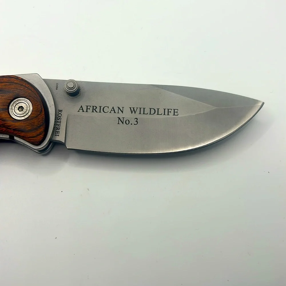 Falkner American Mint - African Wildlife Knife #3 - Lion Engraving